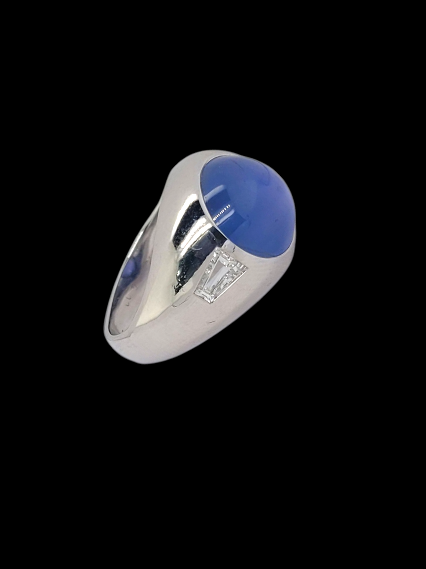 Star sapphire and tapering baguette diamond ring
SKU: 8357
