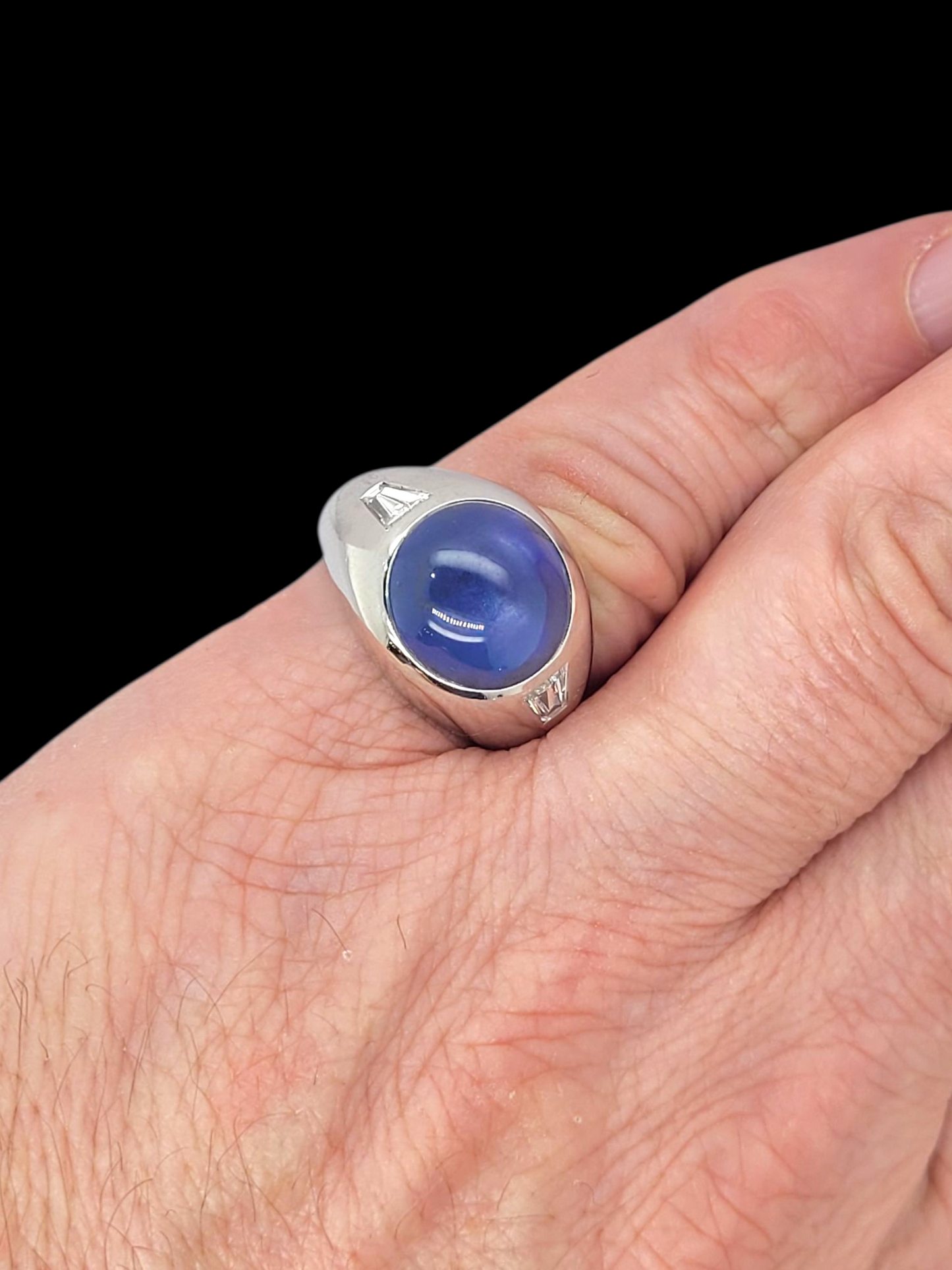 Star sapphire and tapering baguette diamond ring
SKU: 8357