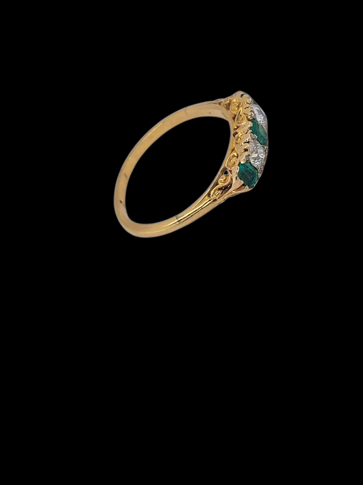 Antique emerald and diamond carved half hoop ring
SKU: 8358