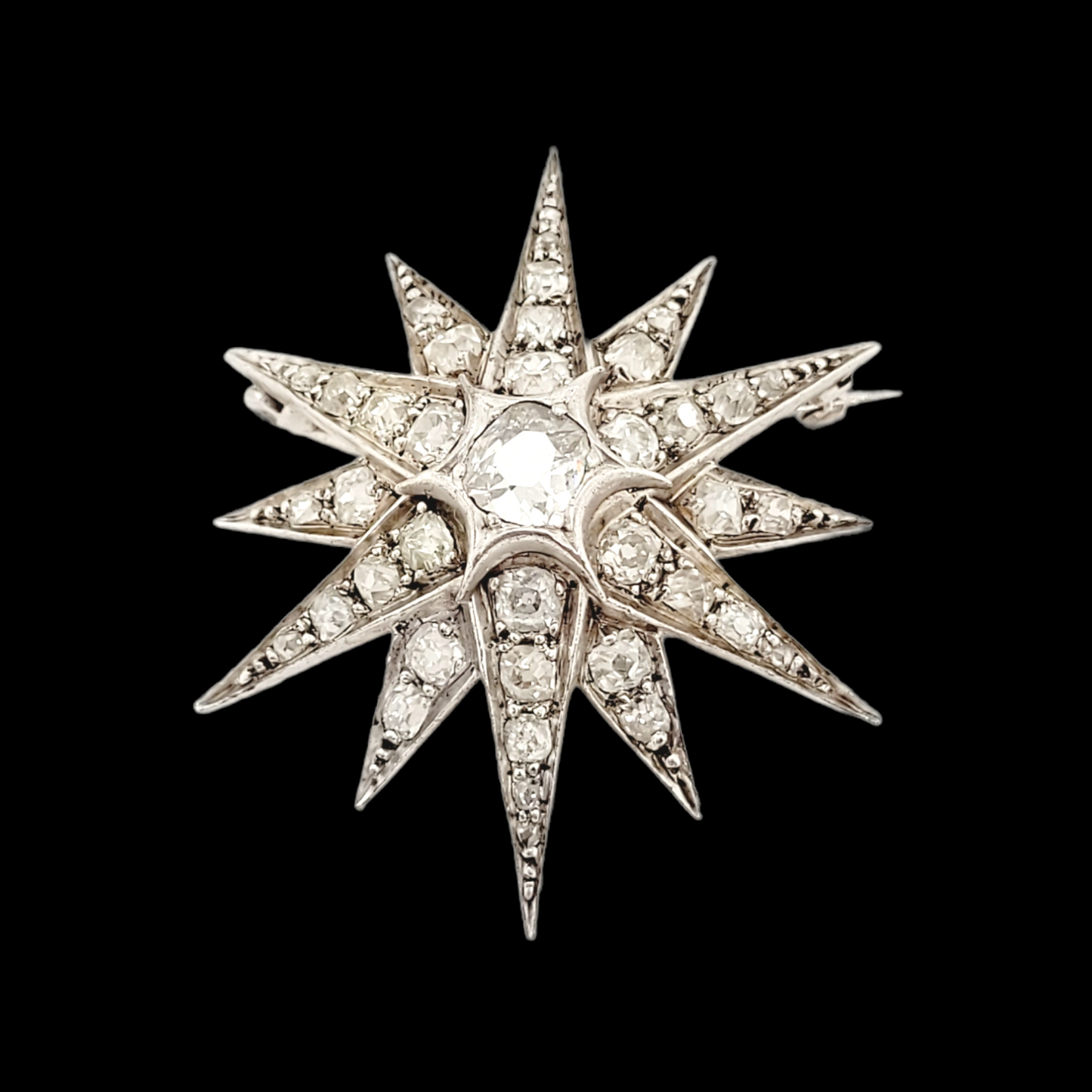 Antique diamond star brooch