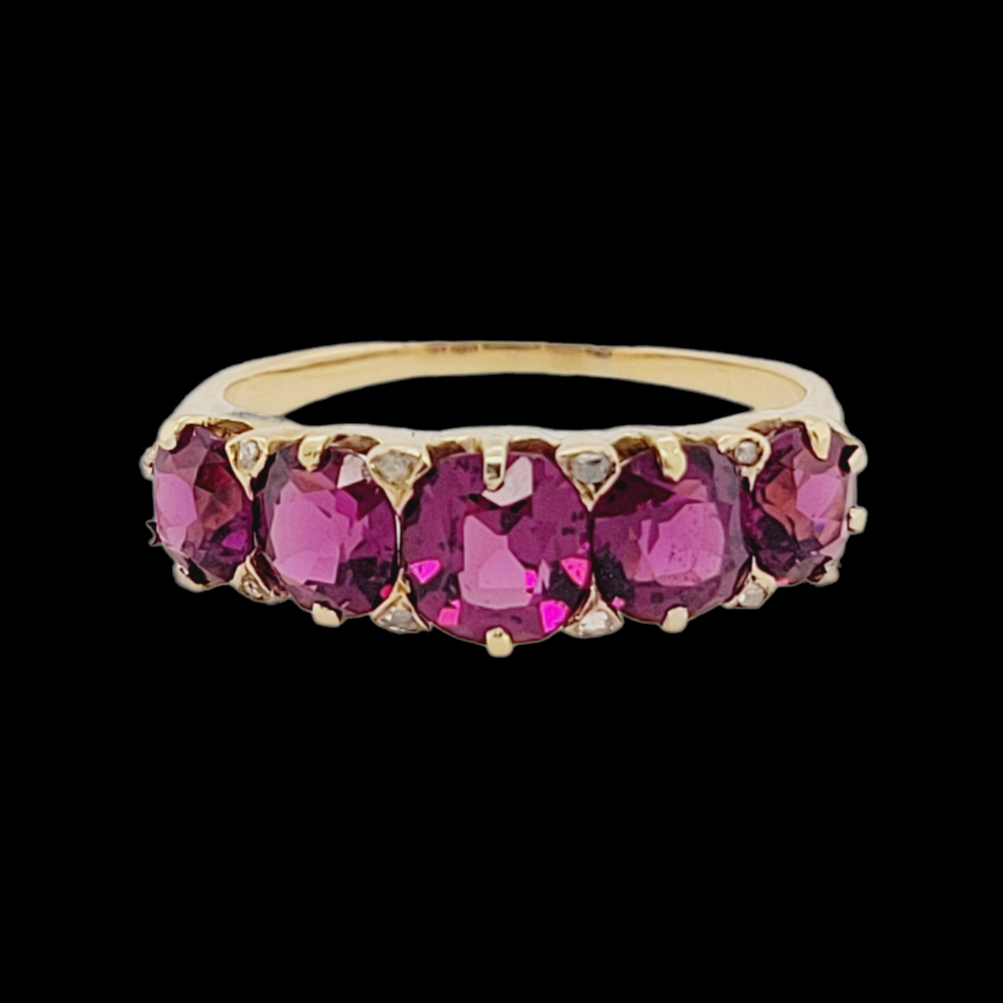 Five stone rhodalite garnet and diamond ring
