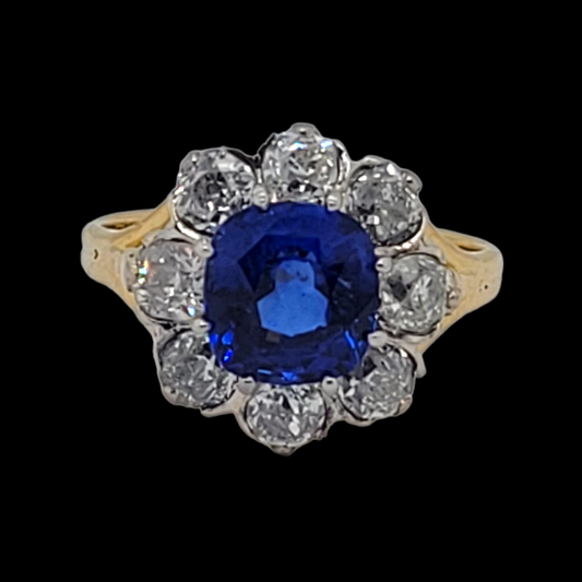 Beautiful sapphire and diamond cluster engagement ring