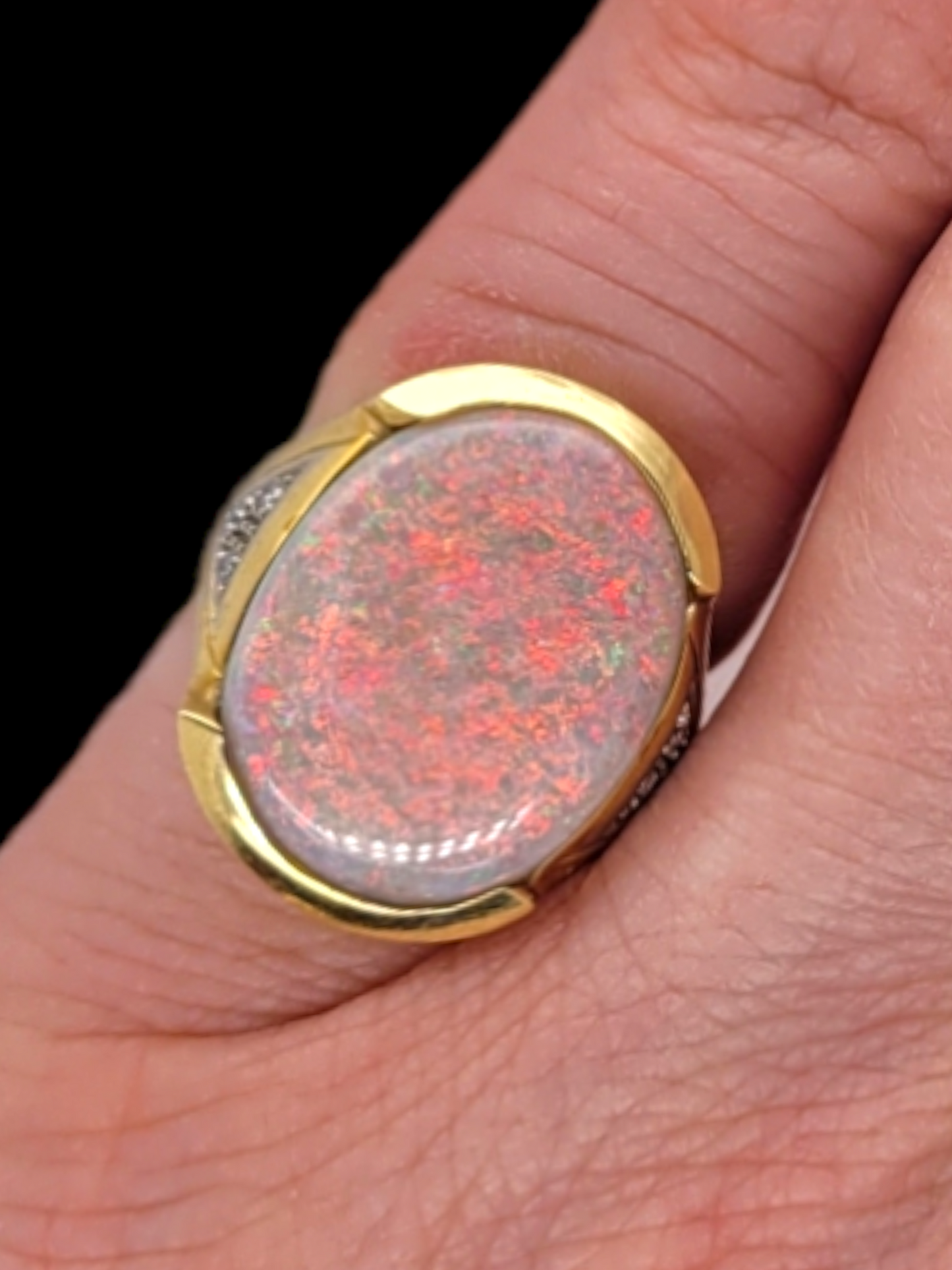 Rare colour change Red to green opal and diamond ring
SKU: 6310