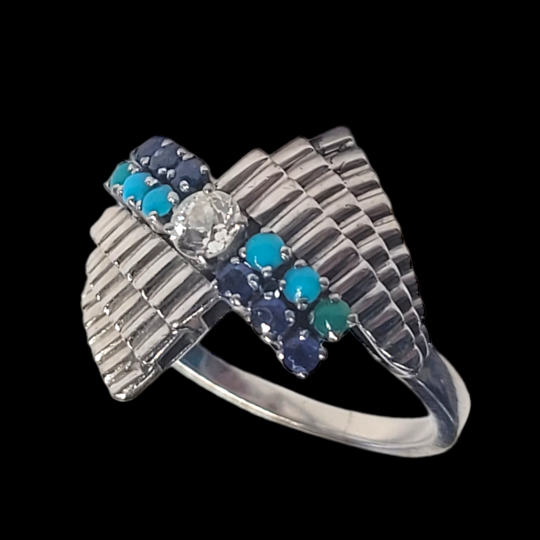 Stylish turquoise sapphire and diamond dress ring
SKU: 6507