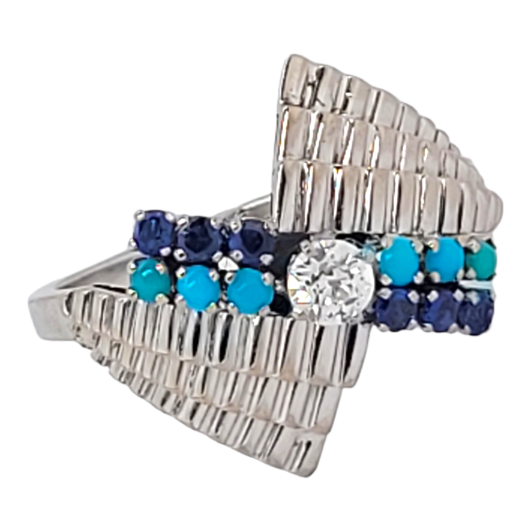 Stylish turquoise sapphire and diamond dress ring
SKU: 6507