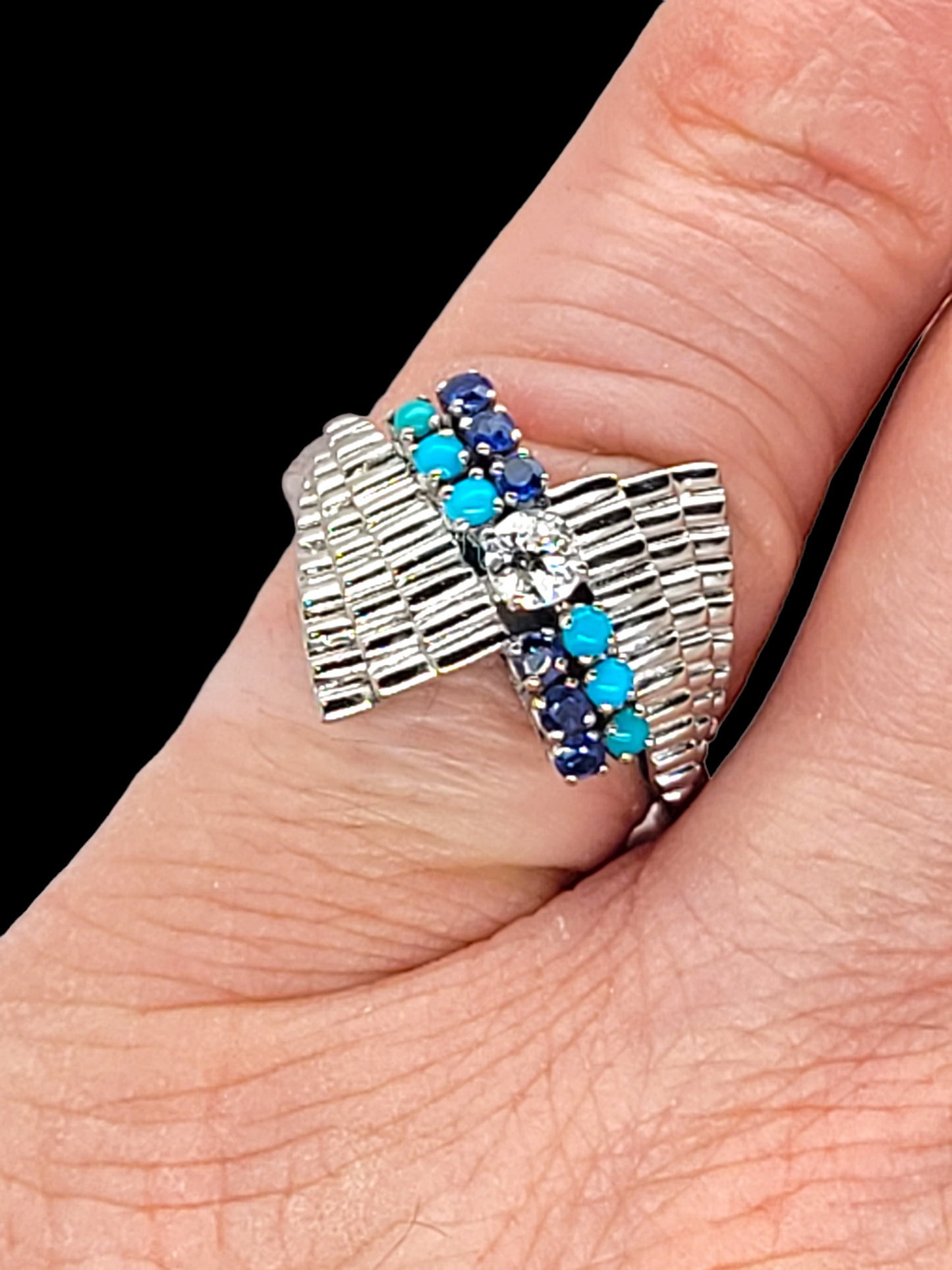 Stylish turquoise sapphire and diamond dress ring
SKU: 6507