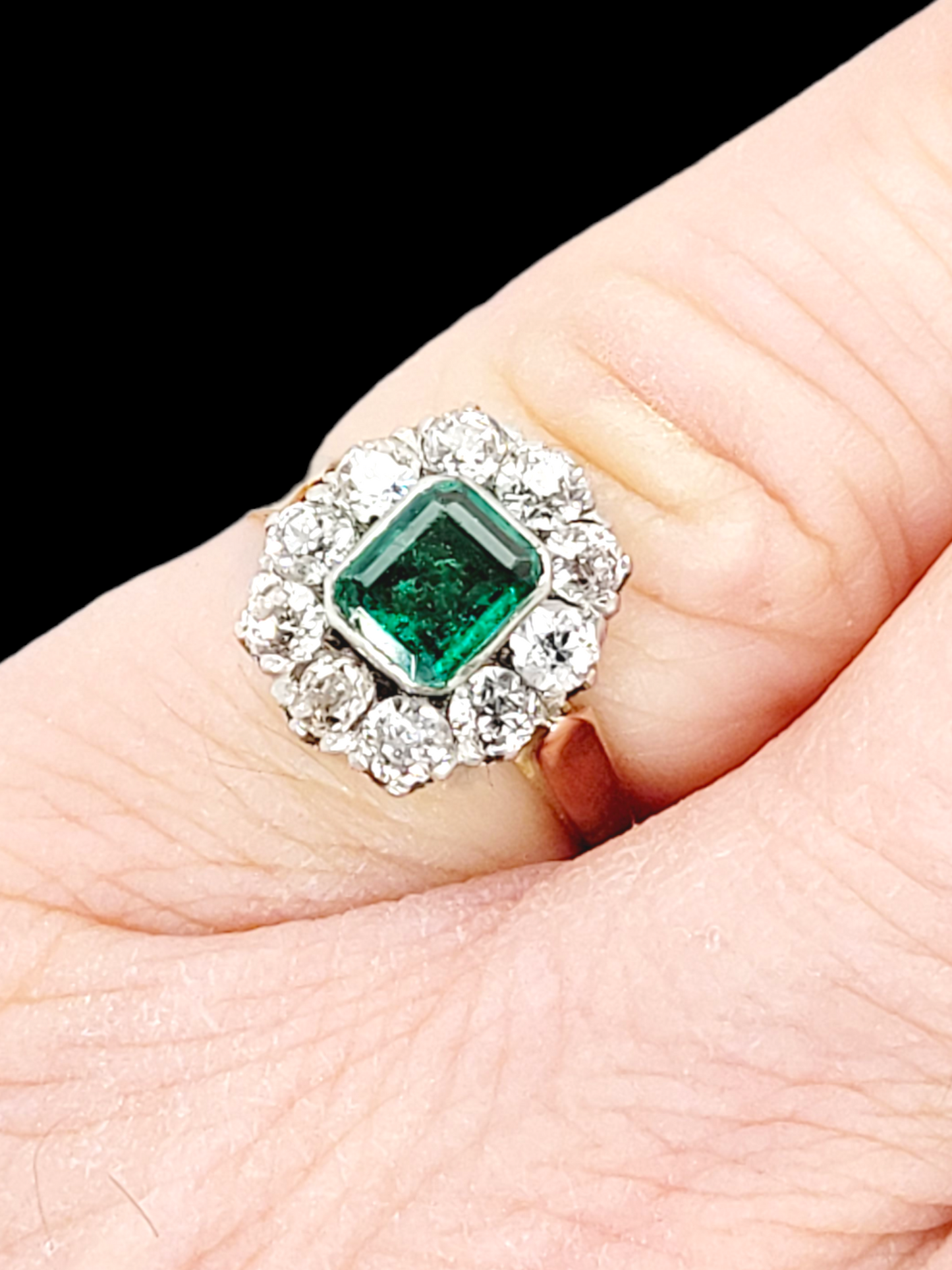 Antique emerald and diamond cluster engagement ring
SKU: 6594