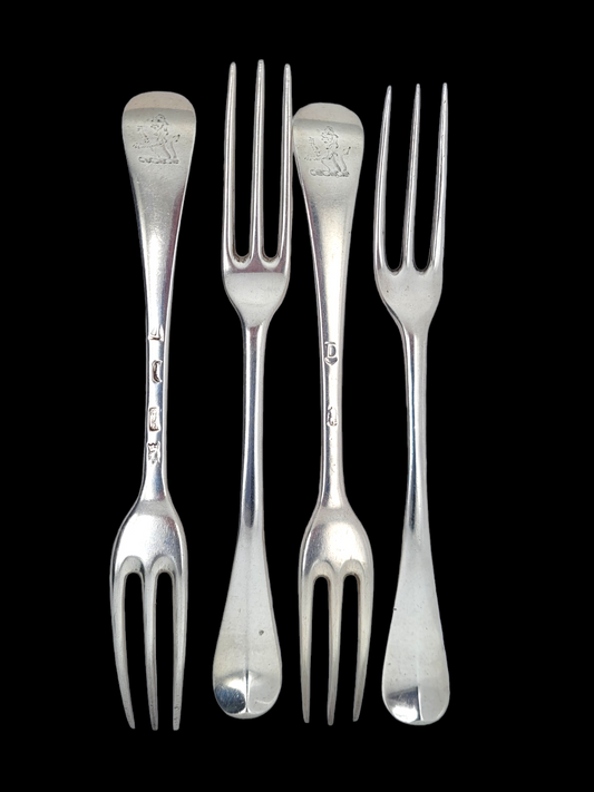Four 1719 Britannia standard table forks
SKU: 6664