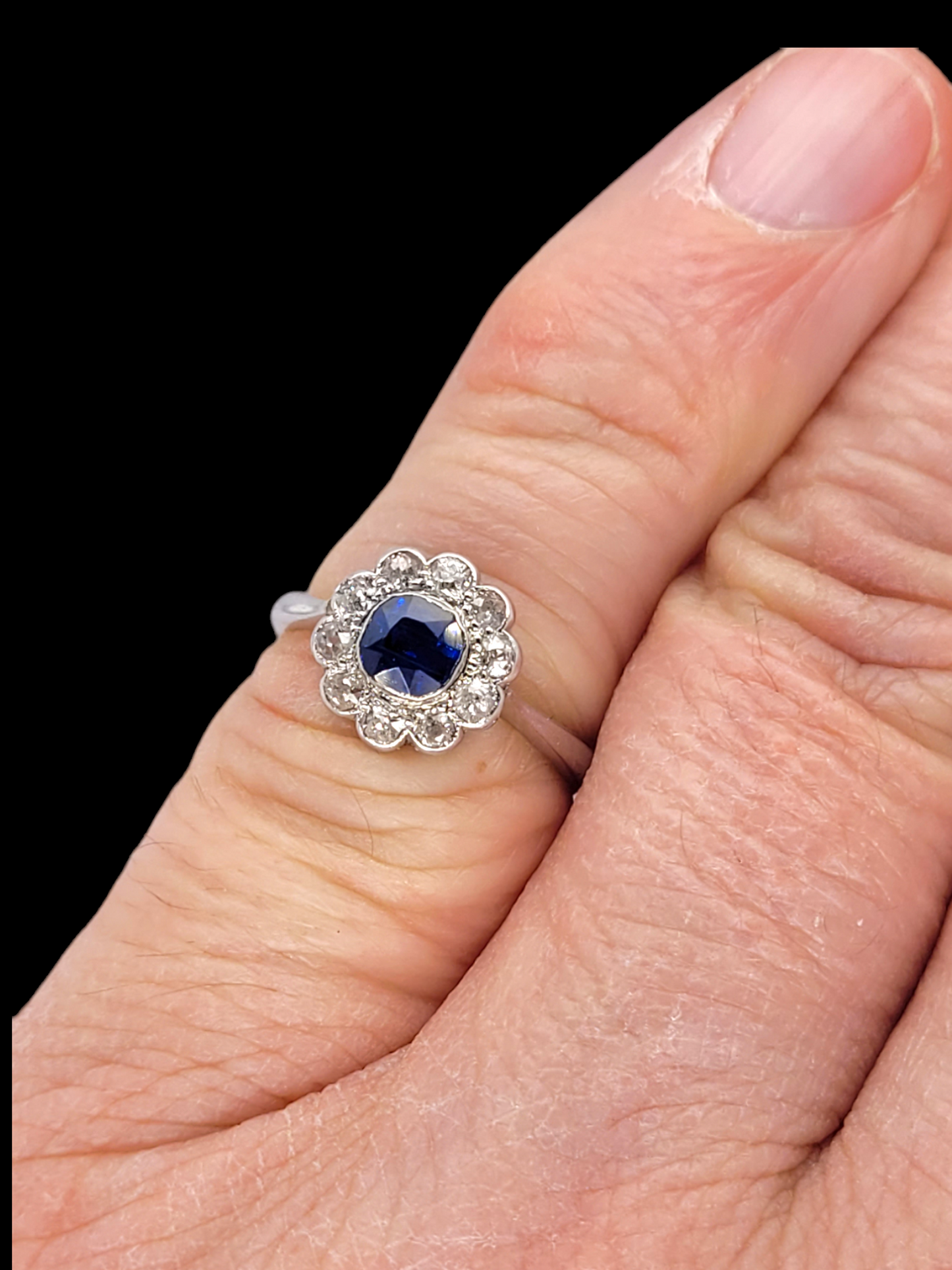 Antique sapphire and diamond daisy cluster ring
SKU: 7223