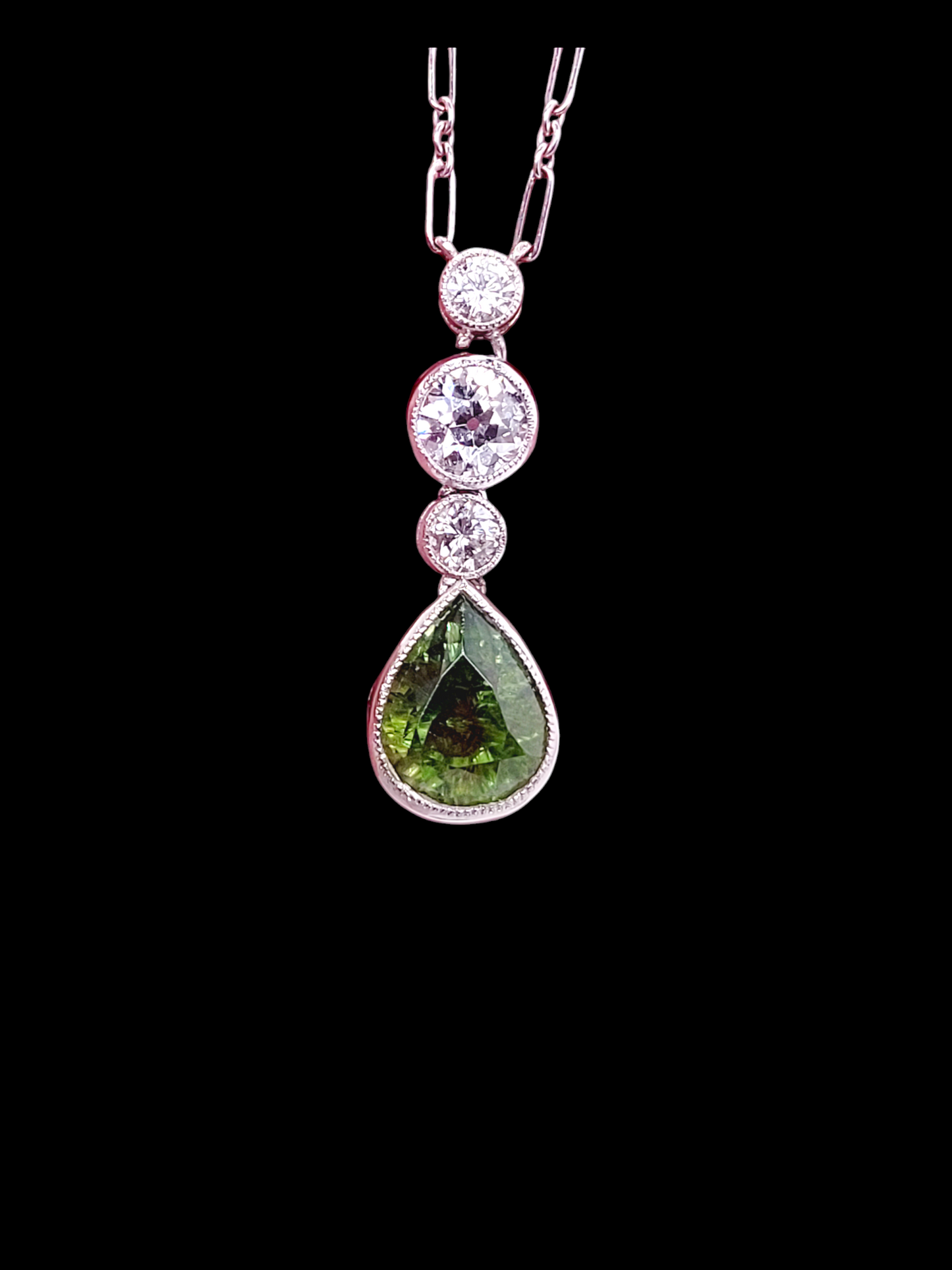 Rare Art deco 2ct pear drop Demantoid green garnet and diamond
SKU: 7606