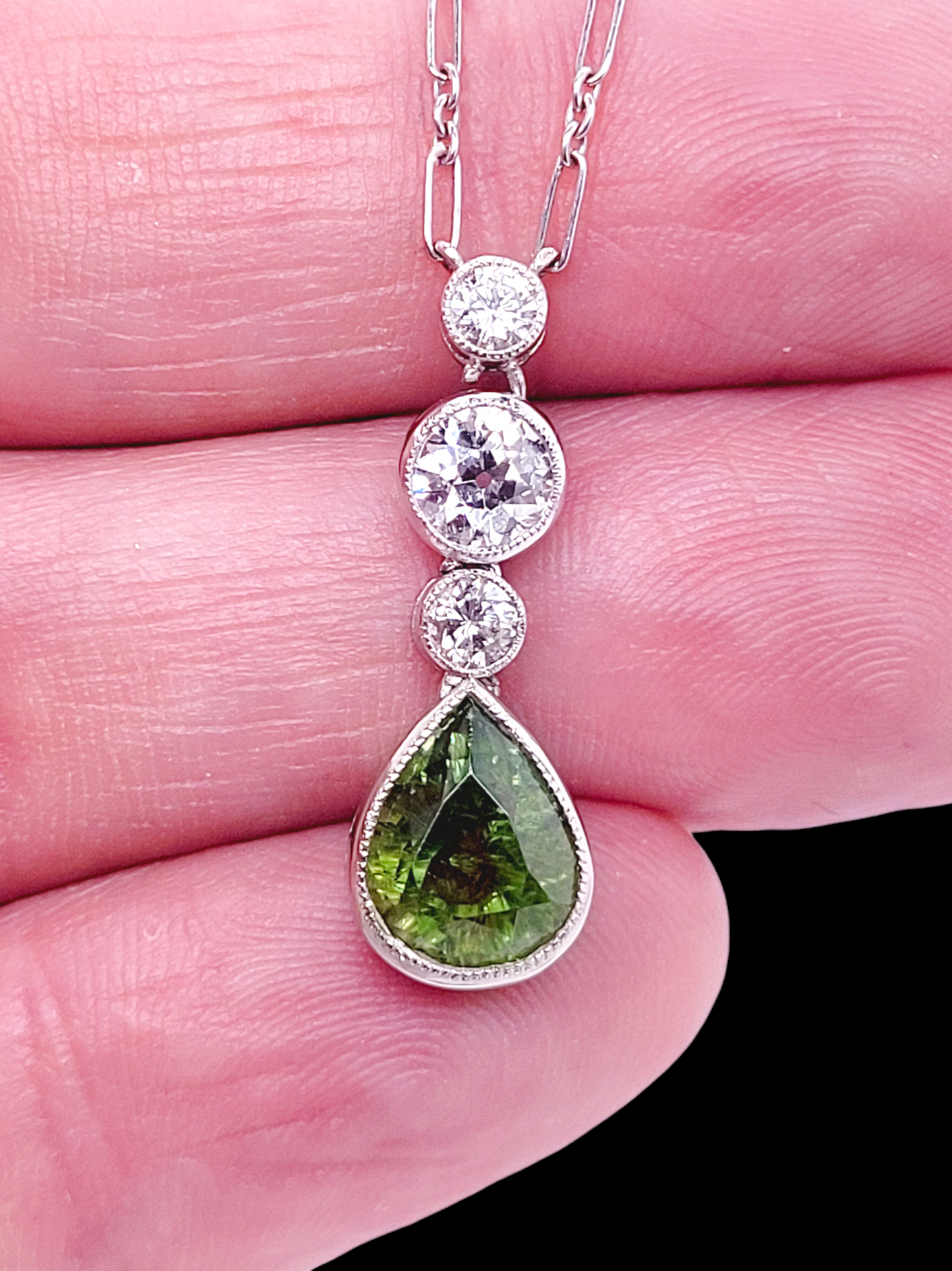 Rare Art deco 2ct pear drop Demantoid green garnet and diamond
SKU: 7606