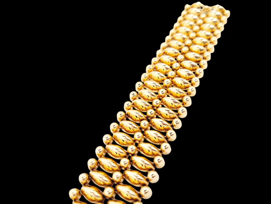 Wide gold tank bracelet
SKU: 7764