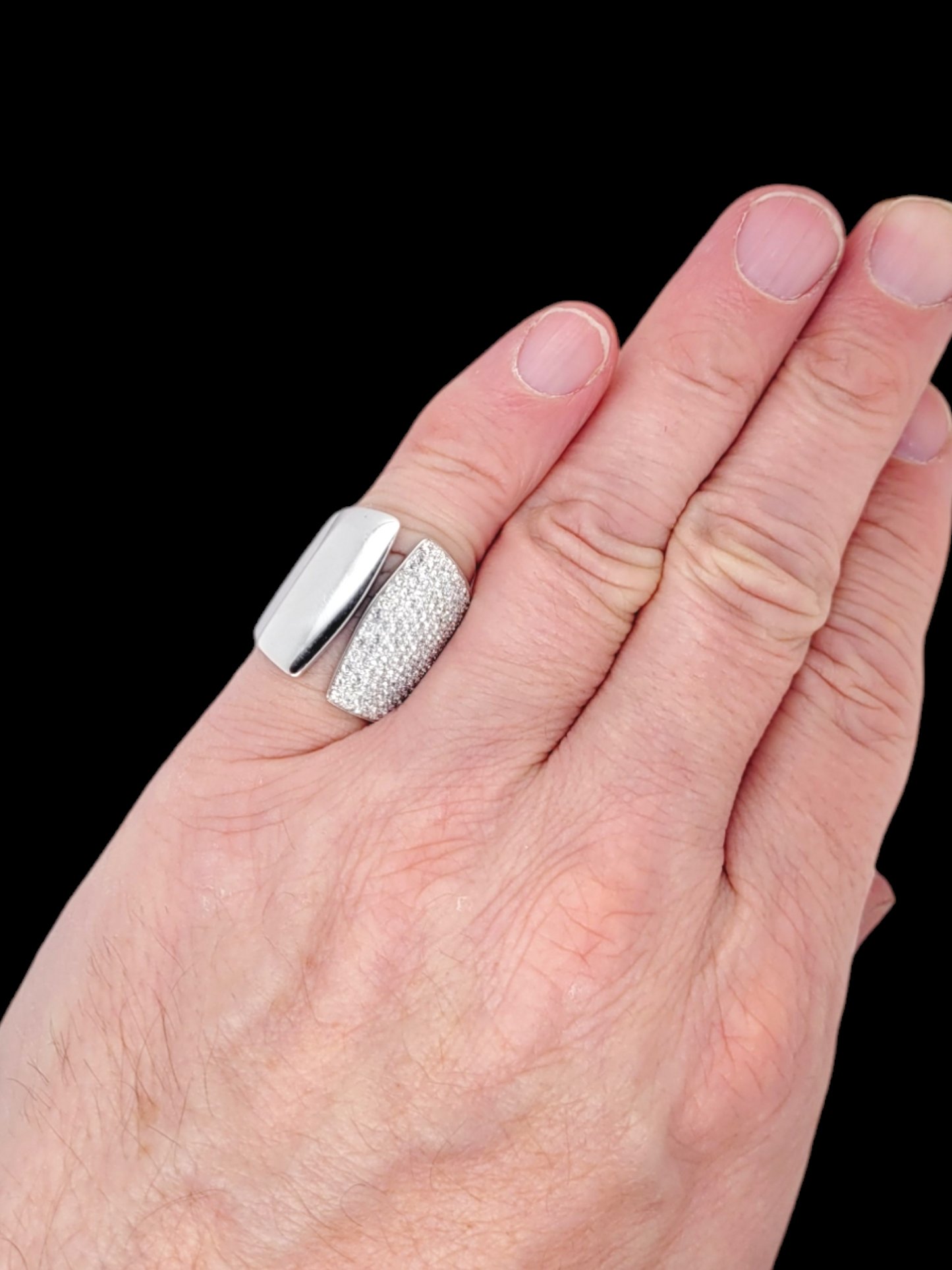 Stylish modern pave diamond and polished 18ct white gold with dress ring
SKU: 7763