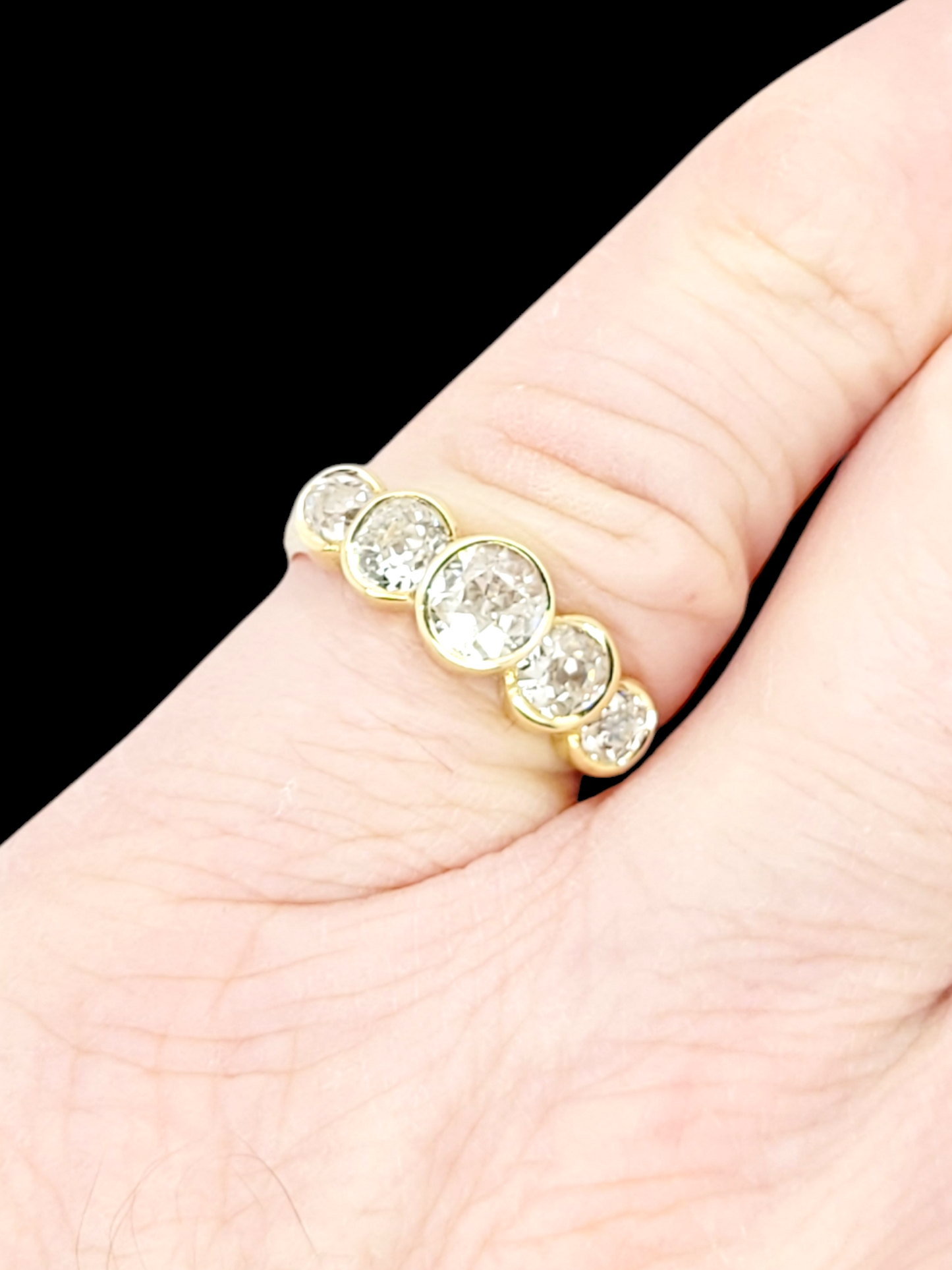 Old mine cut five stone bezel set ring
SKU: 7851