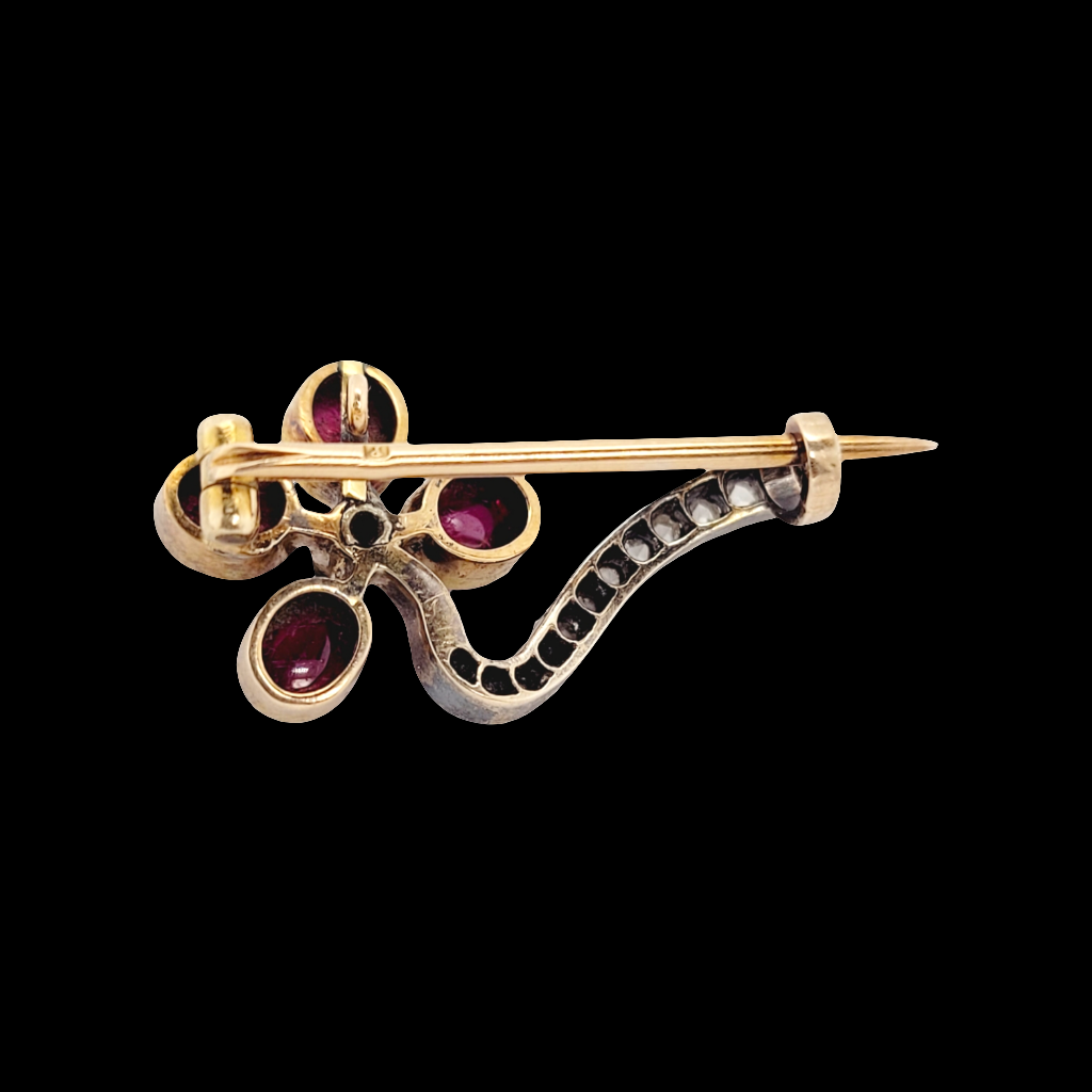Antique cabochon ruby and diamond flower brooch