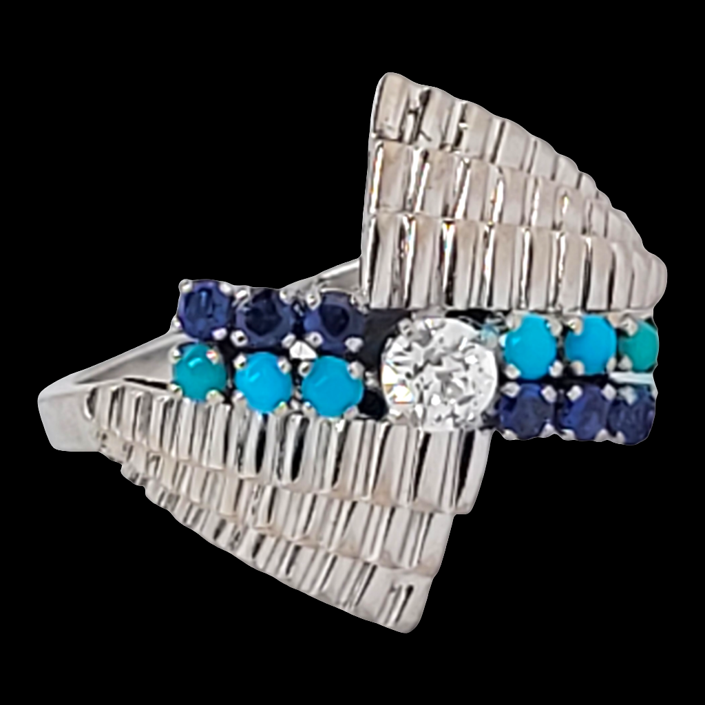 Stylish turquoise sapphire and diamond dress ring
SKU: 6507