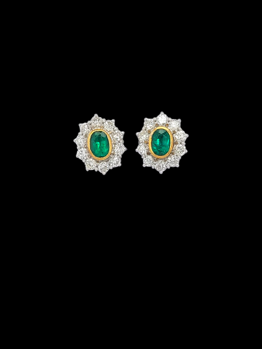 Pair of emerald and diamond oval cluster earrings
SKU: 7956