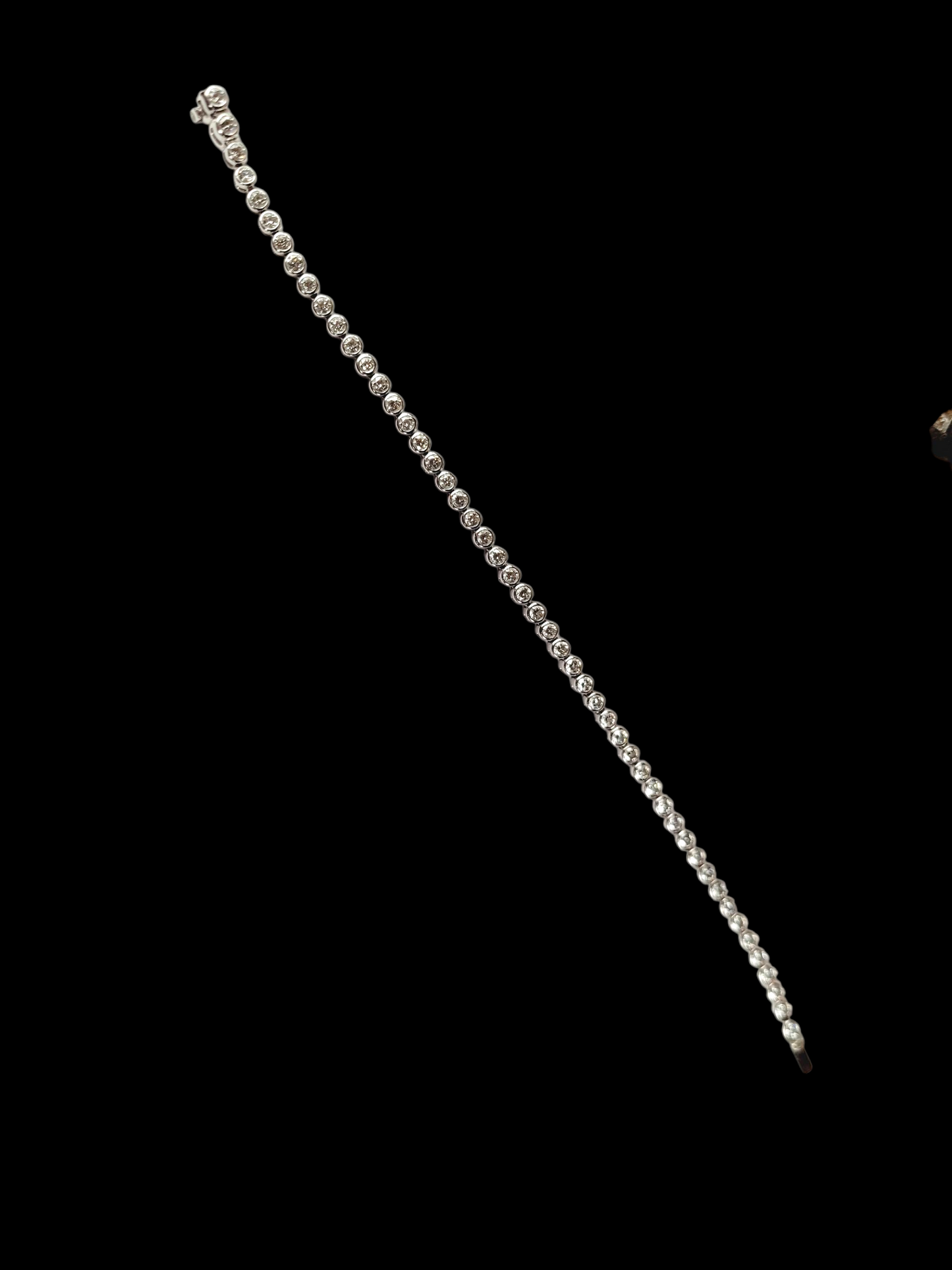 5ct diamond tennis bracelet bezel set in 18ct white gold sku 8500