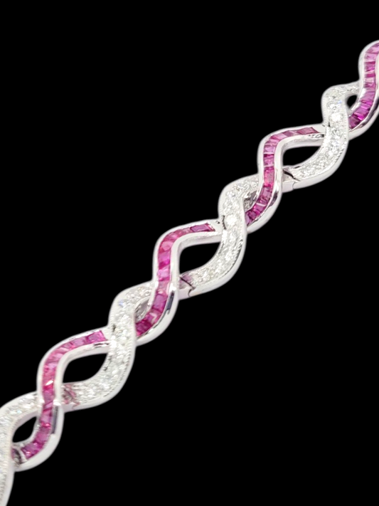 Fine entwined ruby and diamond bracelet
SKU: 8331