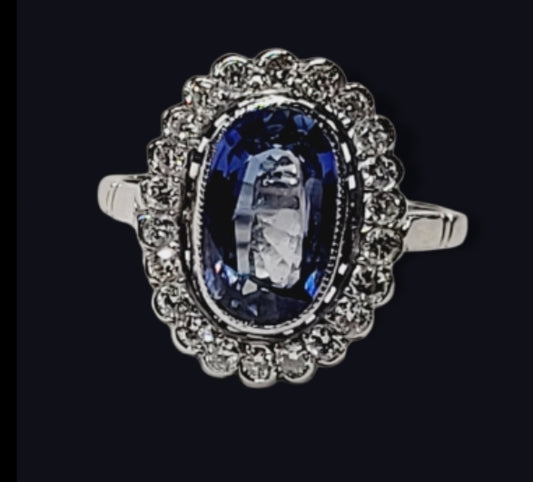 Sapphire and diamond cluster ring
SKU: 5553