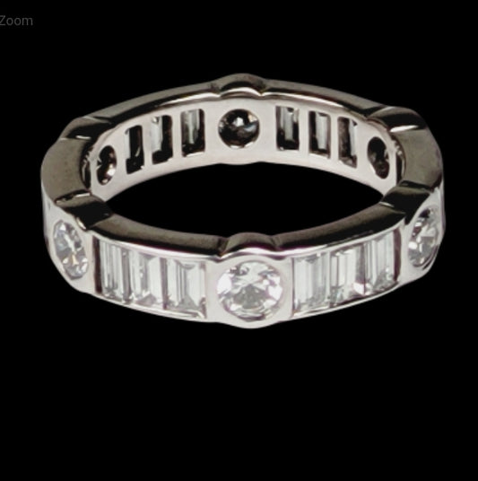 Unusual portrait baguette and brilliant cut diamond band
SKU: 4907