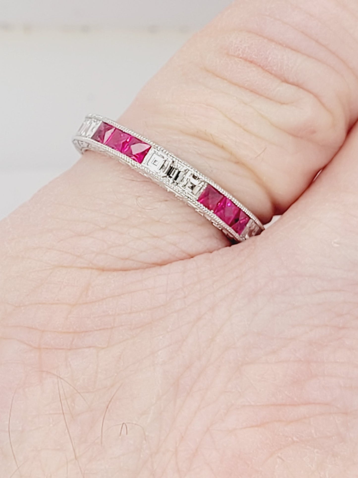 Ruby and diamond engraved platinum eternity band sku 8791