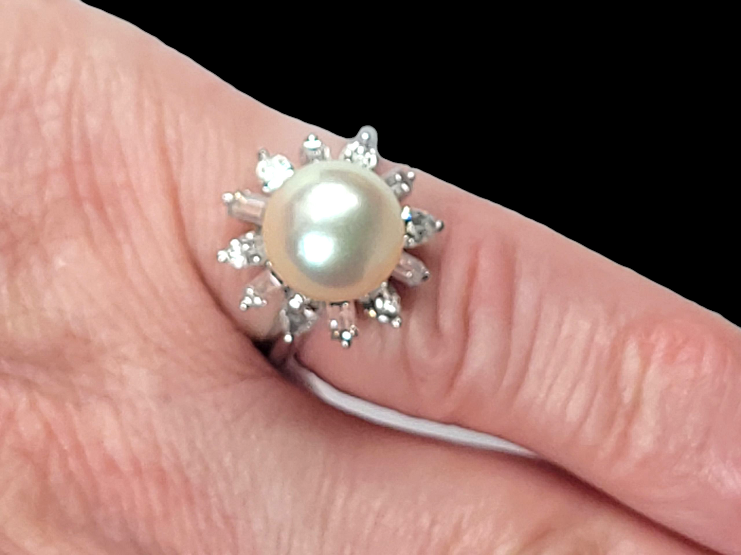 Pearl dress ring with marquise and baguette diamonds
SKU: 8441