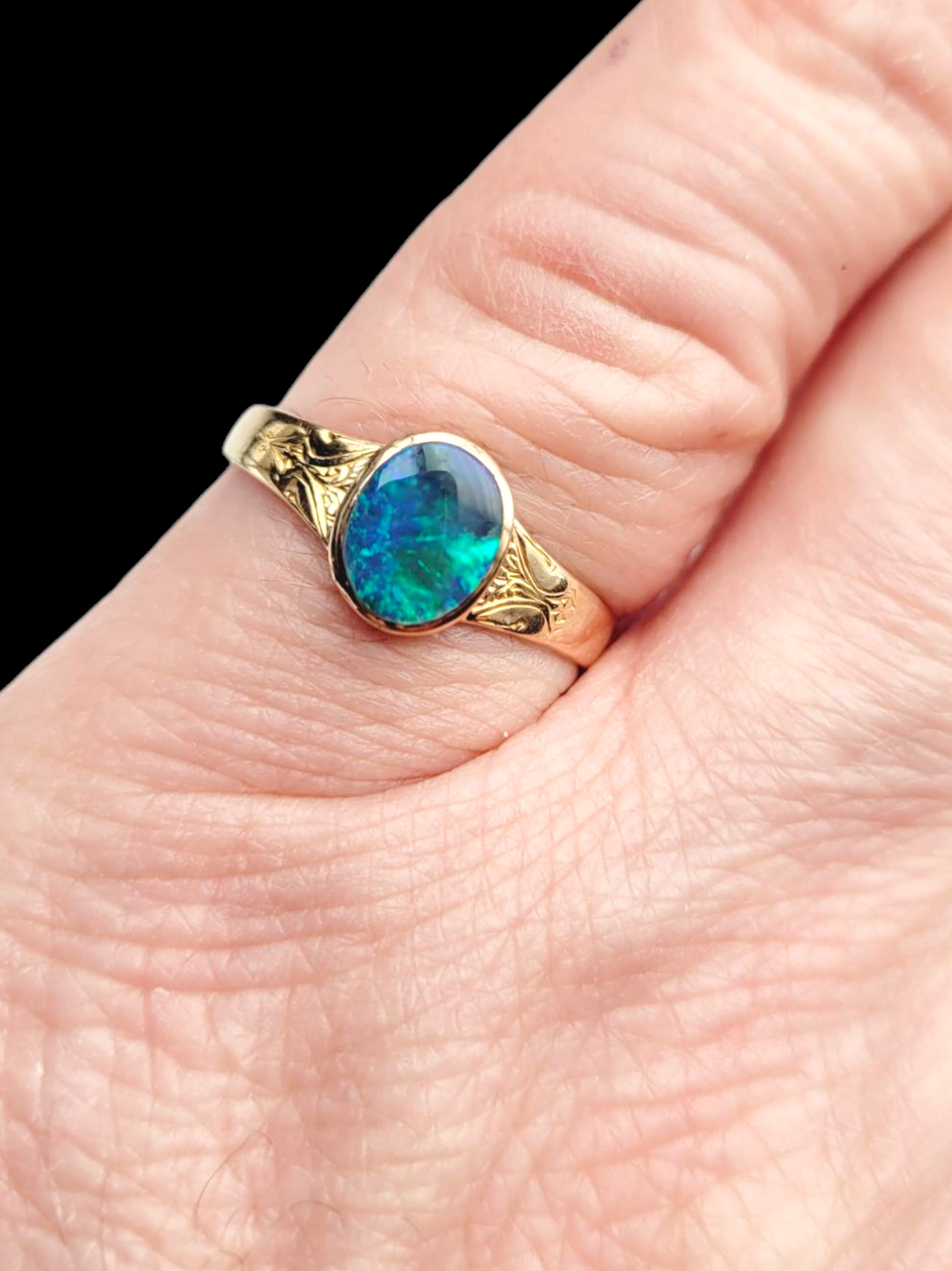 Rare black opal dress ring
SKU: 8053
