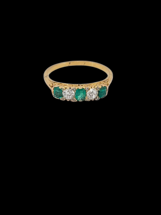 Antique emerald and diamond carved half hoop ring
SKU: 8358
