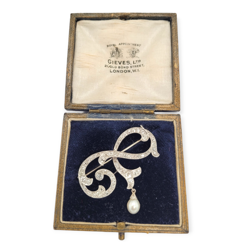 Edwardian diamond and pearl pin

SKU: 6408
