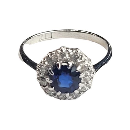 Antique sapphire and diamond cluster engagement ring