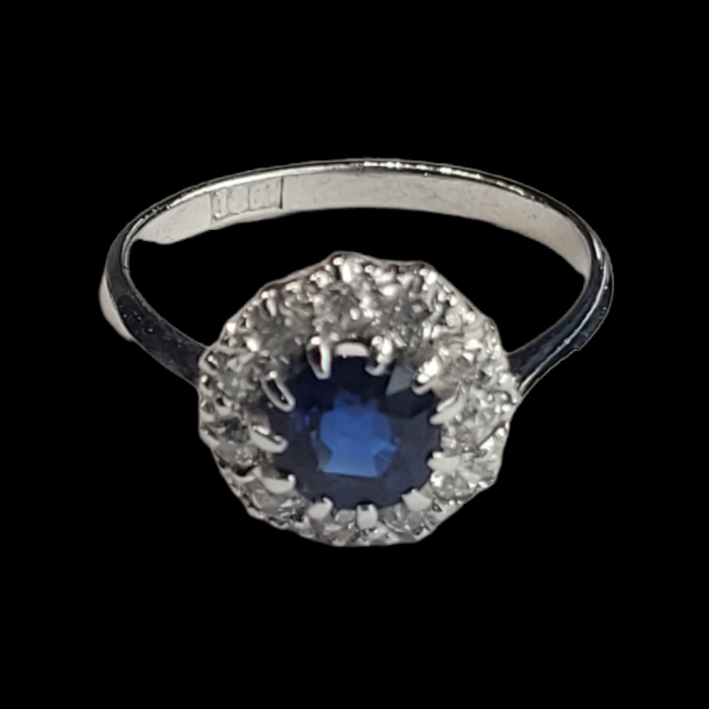 Antique sapphire and diamond cluster engagement ring
