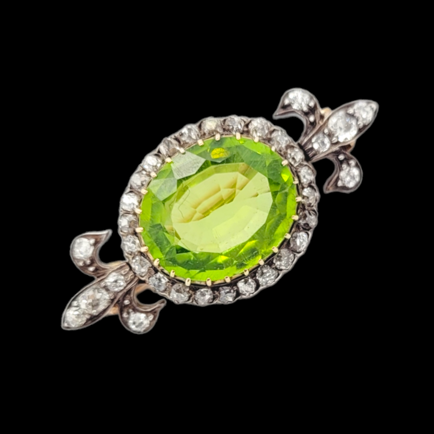 Peridot and diamond brooch