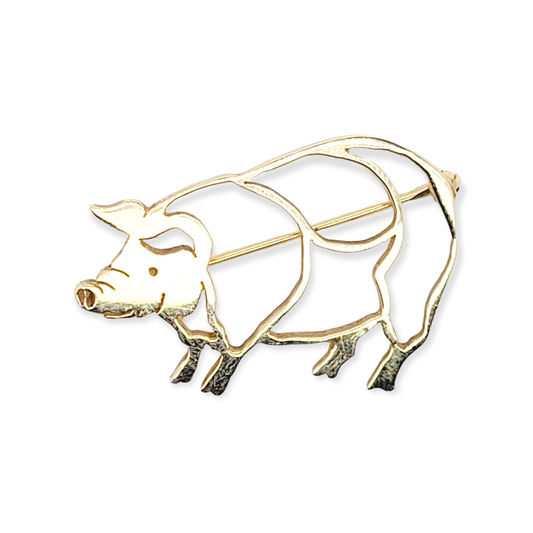 Gold pig brooch