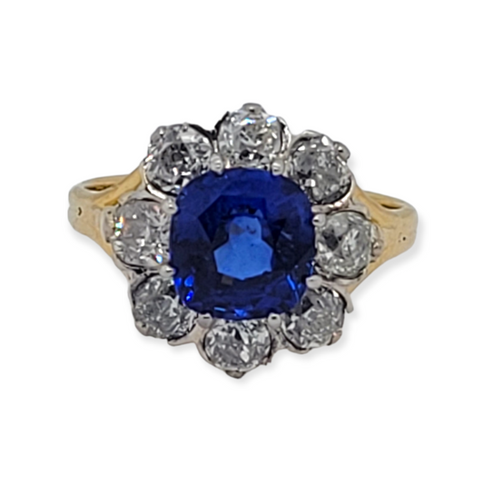 Beautiful sapphire and diamond cluster engagement ring