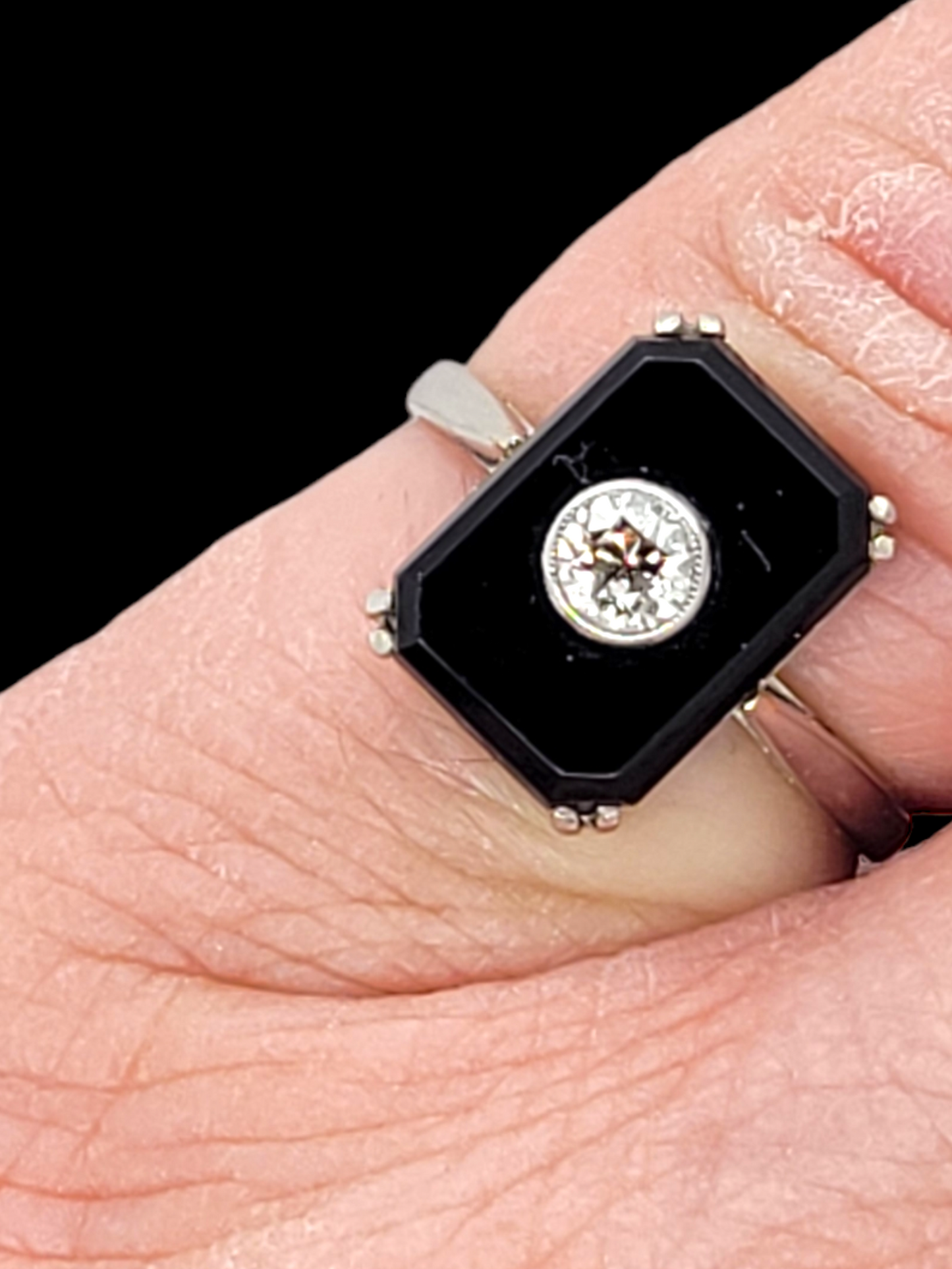 Art deco onyx and diamond dress ring

SKU: 6501