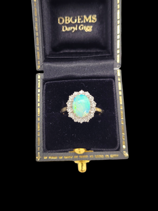 Opal and diamond cluster ring

SKU: 6808