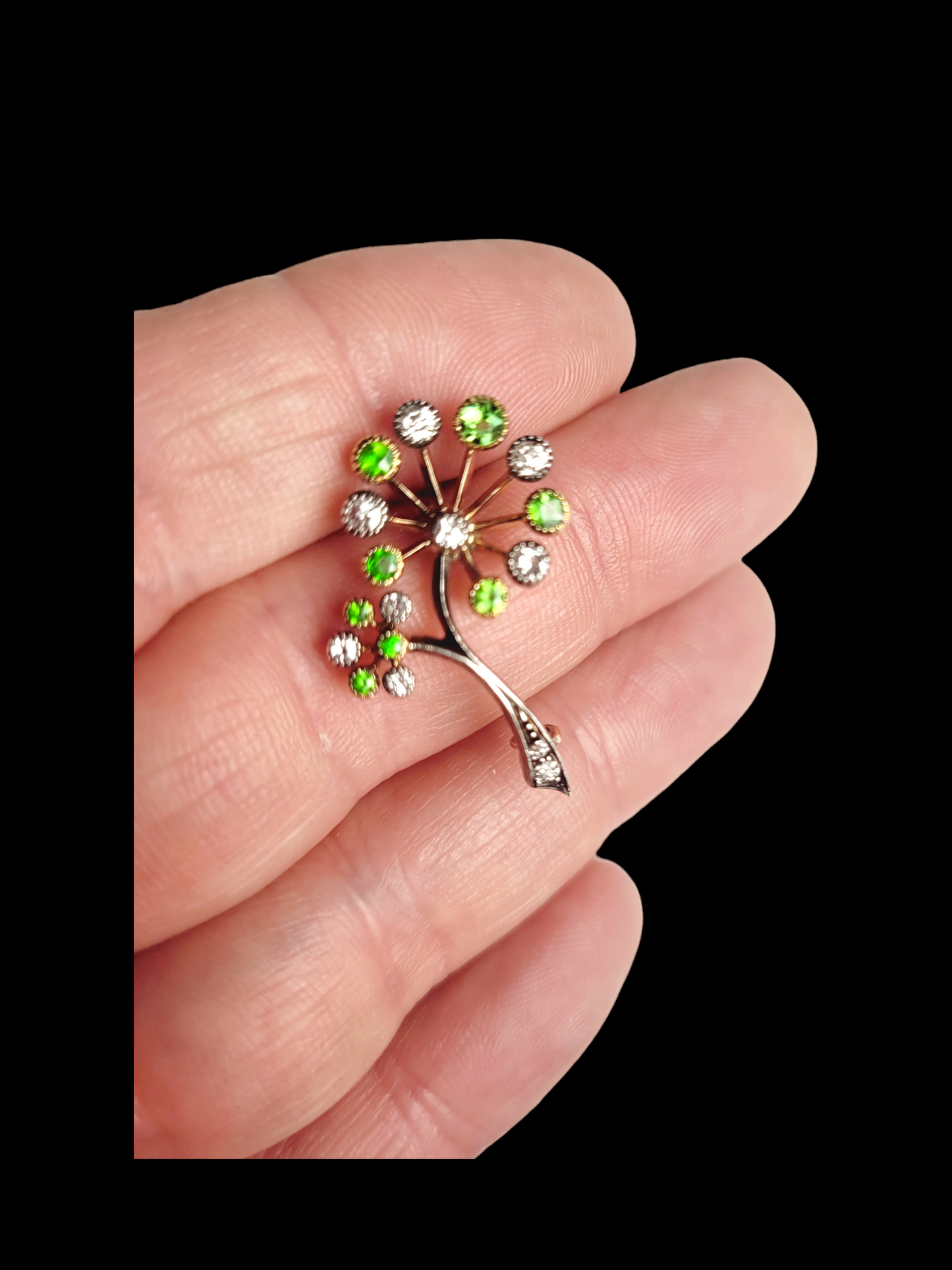Petite and punchy demantoid garnet and diamond flower brooch
SKU: 7389