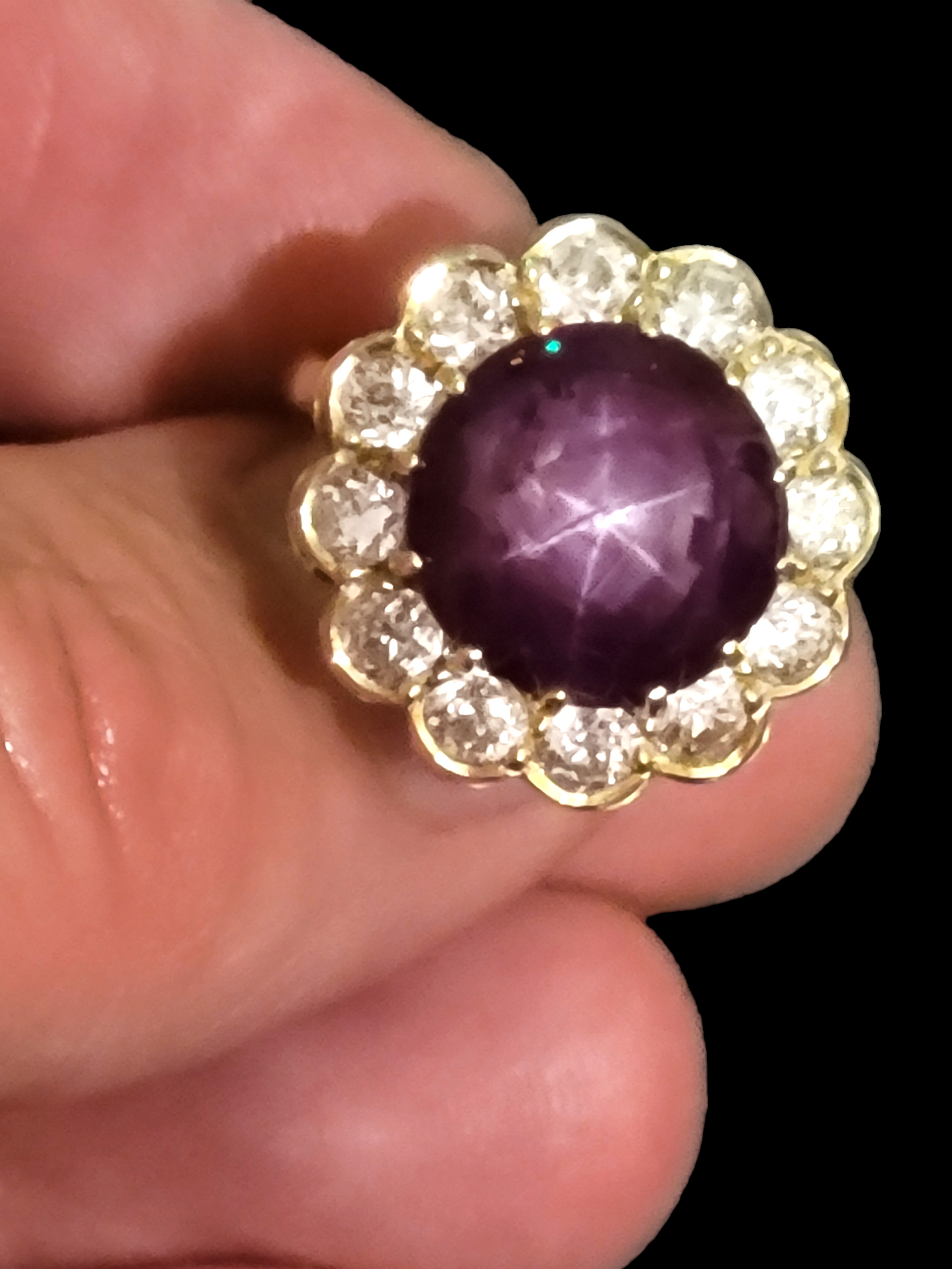 Vintage star ruby and old European transitional cut diamond cluster ring