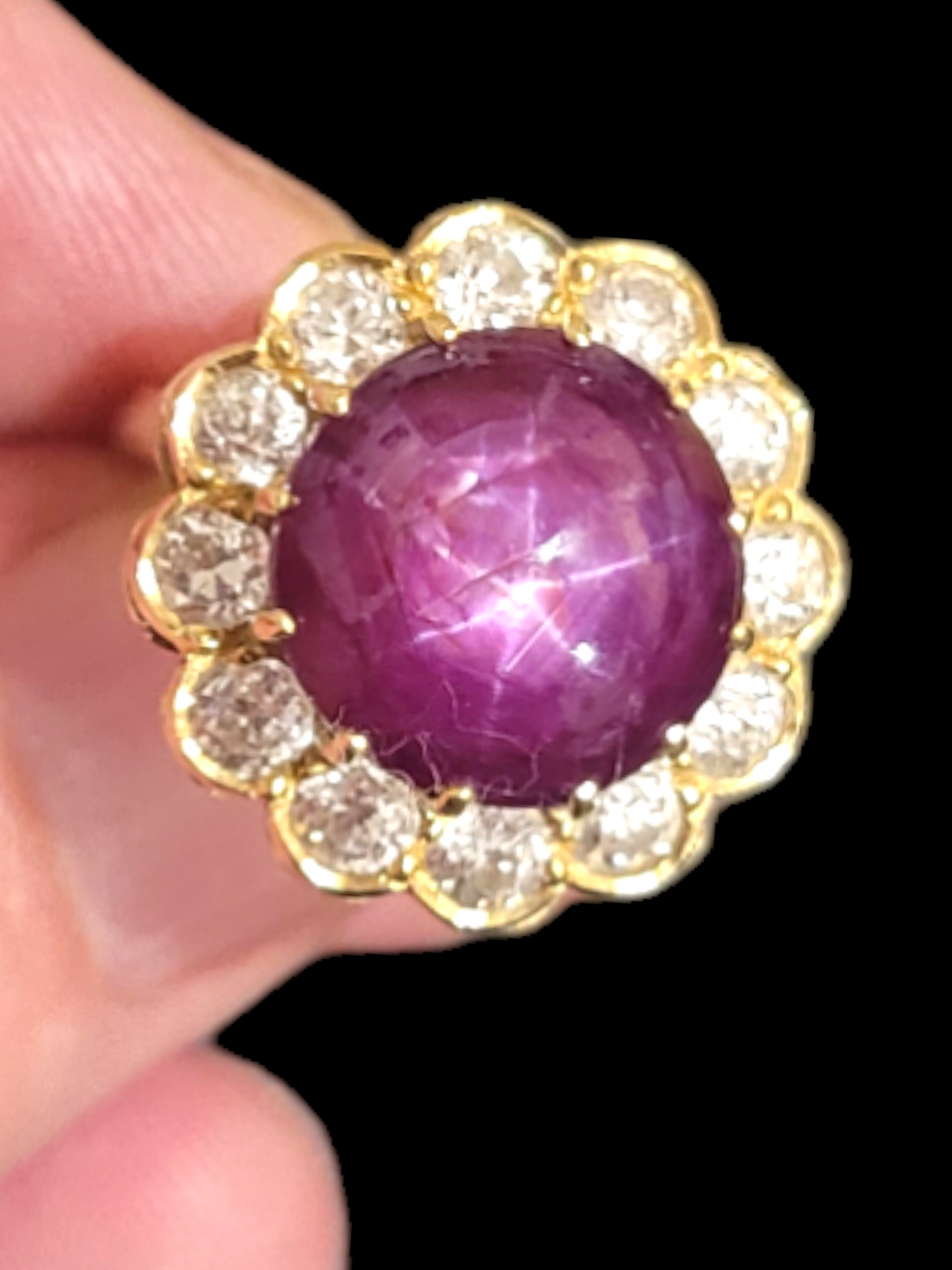 Vintage star ruby and old European transitional cut diamond cluster ring