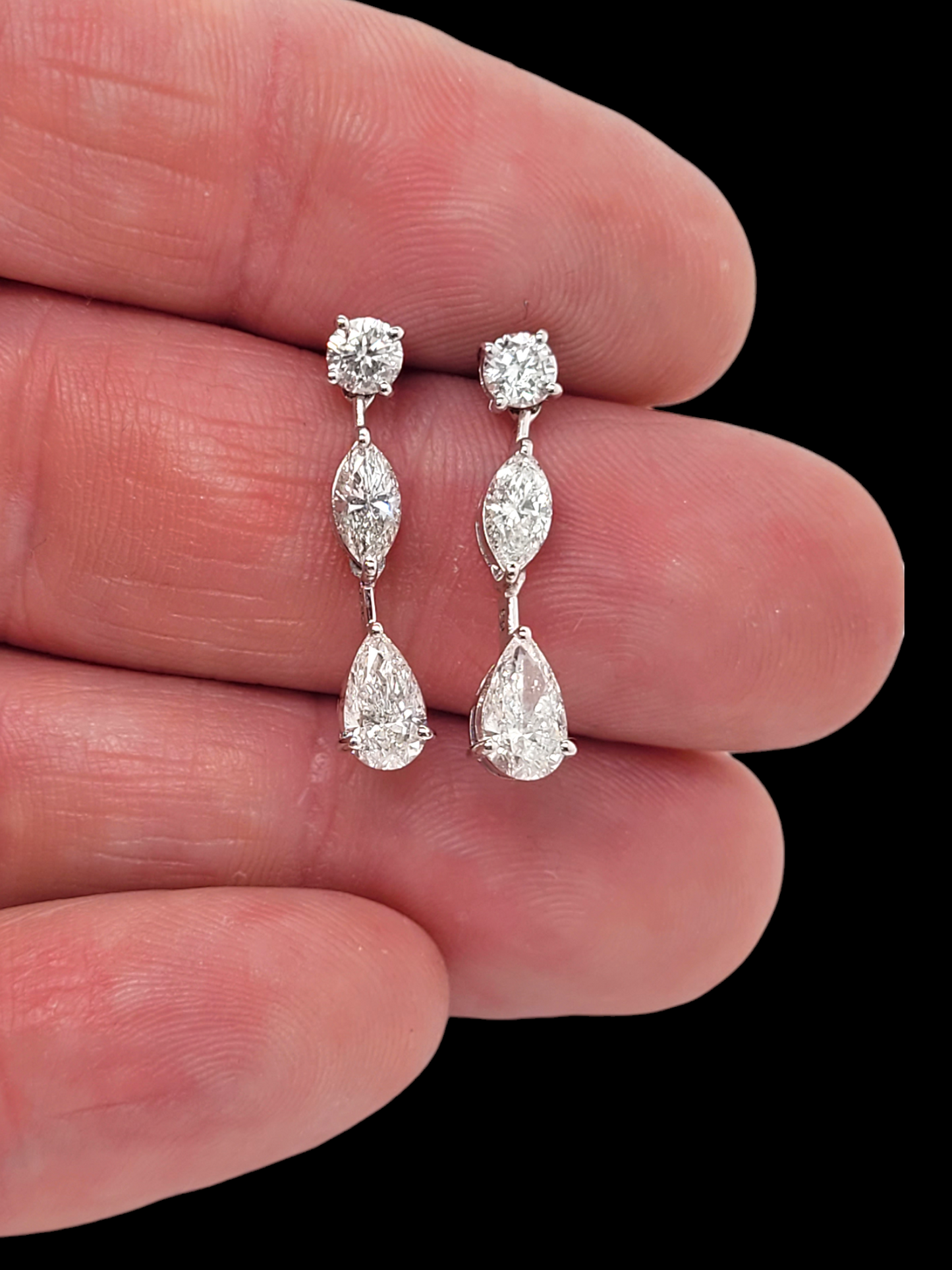 Pair of modern diamond drop earrings
SKU: 7685