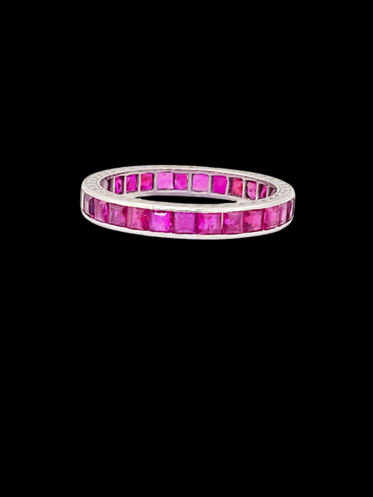 Art deco calibre ruby eternity band
SKU: 7919
