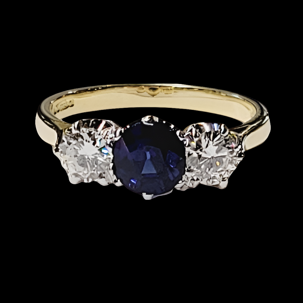 Sapphire and diamond three stone engagement ring
SKU: 5548