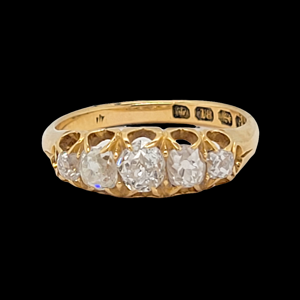 Old mine cut five stone diamond ring

SKU: 6390