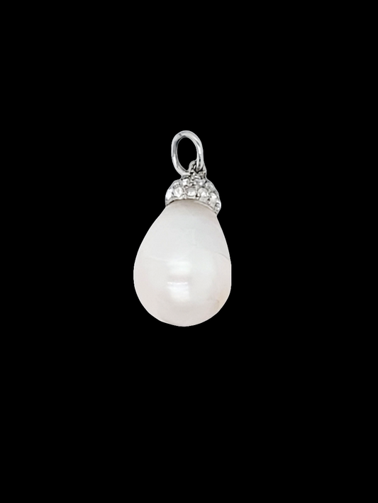 Edwardian Natural pearl and diamond pendant drop

SKU: 6556