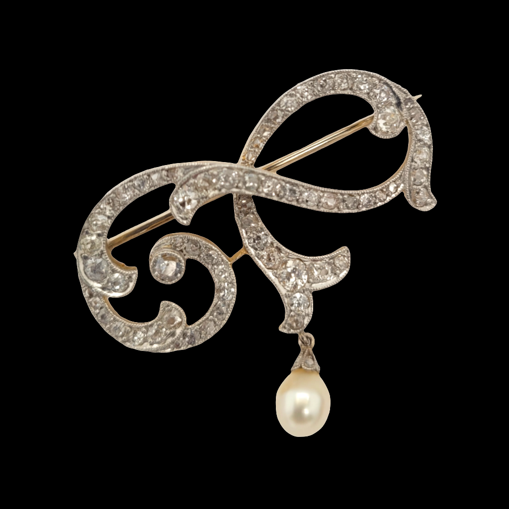Edwardian diamond and pearl pin

SKU: 6408