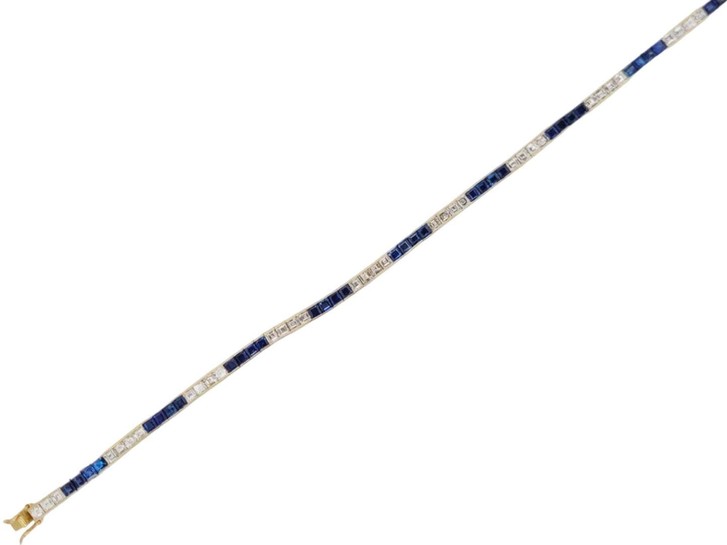 Sapphire and diamond calibre square Sapphire and diamond bracelet in 18ct yellow gold Sku 9011