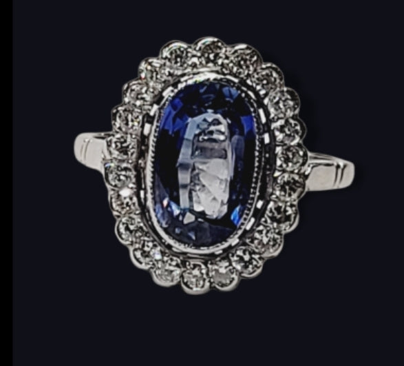 Sapphire and diamond cluster ring
SKU: 5553