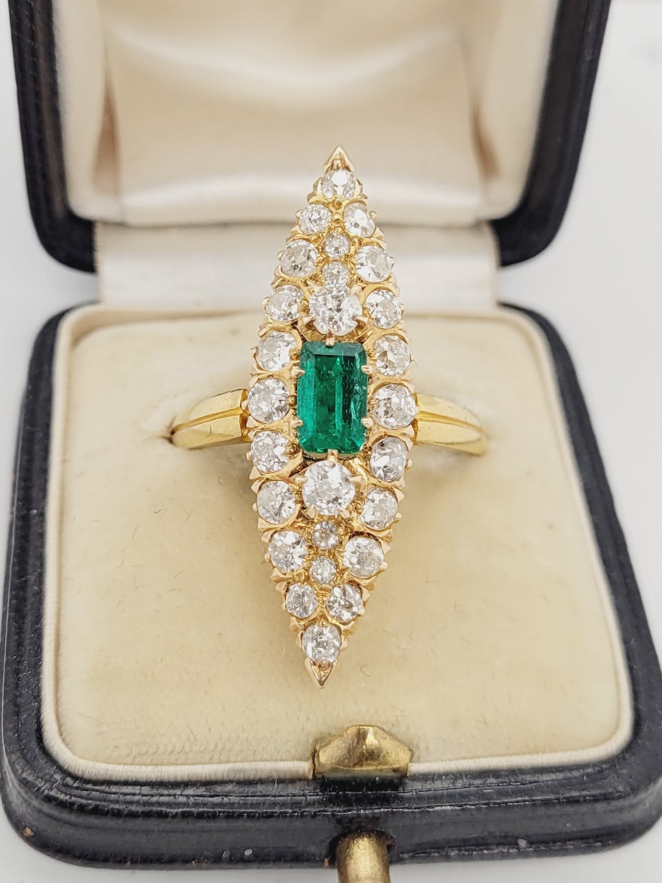 Antique emerald and diamond navette shaped ring
sku 8544