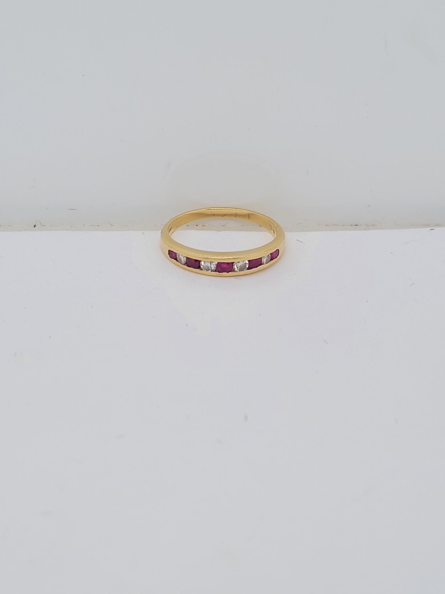 Ruby and diamond half eternity ring sku 9166
